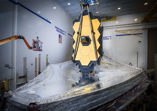 The assembled telescope stands tall with its mirror folded at Northrop Grumman’s facility in California. Northrop Grumman