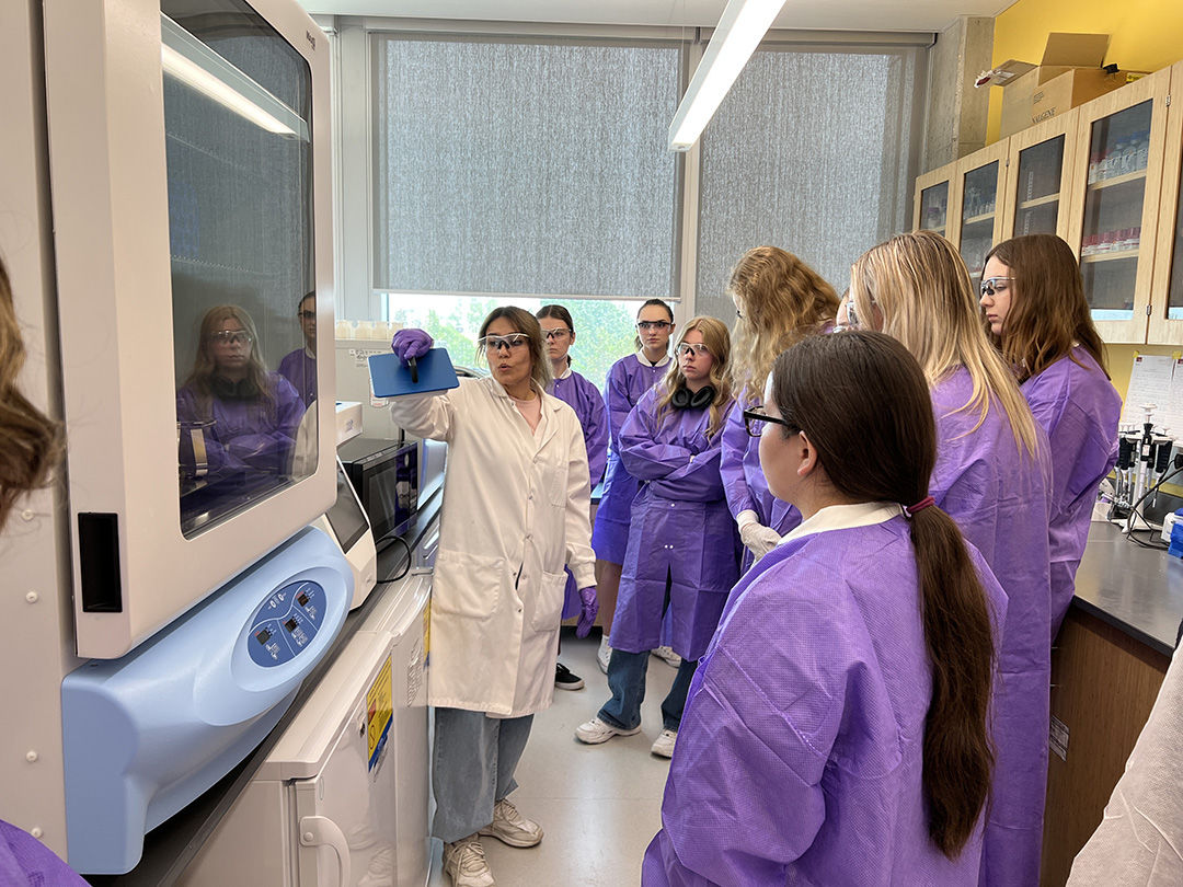 Image: Dr. Atefeh Najafi, Ph.D., gives a tour of the Benson Cryobiology Lab to a group of high school students. Credit: Royal University Hospital Foundation