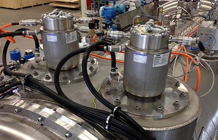 A CryoZone pump installed in a customer's cryostat, including valves and instrumentation