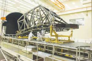 Engineers at Marshall Space Flight Center in Huntsville AL remove the James Webb Space Telescope's backplane from the cryogenic test chamber. Photo courtesy NASA/MSFC/Fred Deaton