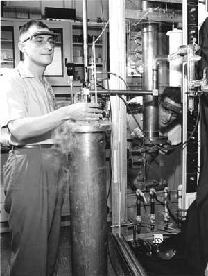 Fred Edeskuty and James (Stretch) Fretwell testing a scale model of the LH2 piping system for Test Cell C (Rover Program). This photo was taken in the 1960s. Photo submitted by Walter Stewart. 