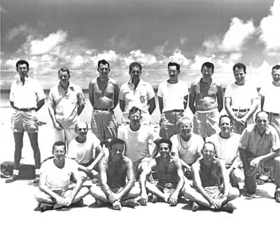A group of cryogenic scientists and engineers who were involved in Operation Greenhouse, or Operation Hardtack, in the 1950s. The photo was taken on an island in the south Pacific. Top row (left to right): John H. Sullivan, Cal Potts, Fred Edeskuty, Jim Harbow, Gene Kerr, Ed Grilly, Ed Hammel, Dean Meyer. Middle row (left to right): Adam Schuch, Tom Sandenaw, Marty Hoglund, Bob Mills, Bill Hutchinson. Bottom row (left to right): Chuck Hood, Roy (last name unknown), George Hofreiter, Al Sesonske. Photo submitted by Walter Stewart. 