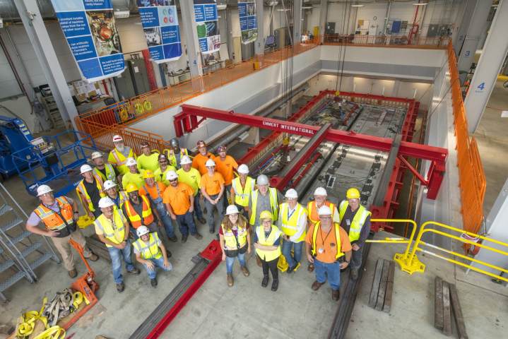 Members of the crew that moved ICARUS stand by the detector. Photo: Reidar Hahn