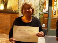 Donna Jung holds a sign made for the Cryomafia get-together at ASC'12.