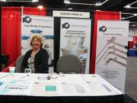 Donna Jung at the International Cryogenics booth at the 2012 Applied Superconductivity Conference in Portland, Oregon.